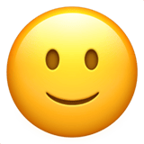 Apple design of the slightly smiling face emoji verson:ios 16.4