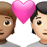 Apple design of the couple with heart: person person medium skin tone light skin tone emoji verson:ios 16.4