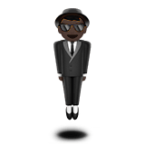 Apple design of the person in suit levitating: dark skin tone emoji verson:ios 16.4
