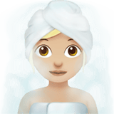 Apple design of the woman in steamy room: medium-light skin tone emoji verson:ios 16.4
