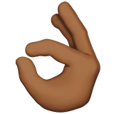 Apple design of the OK hand: medium-dark skin tone emoji verson:ios 16.4