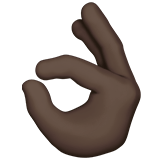 Apple design of the OK hand: dark skin tone emoji verson:ios 16.4