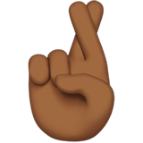 Apple design of the crossed fingers: medium-dark skin tone emoji verson:ios 16.4