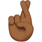 Apple design of the crossed fingers: medium-dark skin tone emoji verson:ios 16.4