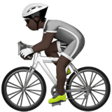 Apple design of the person biking: dark skin tone emoji verson:ios 16.4