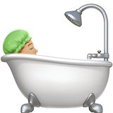 Apple design of the person taking bath: medium-light skin tone emoji verson:ios 16.4