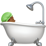 Apple design of the person taking bath: medium-dark skin tone emoji verson:ios 16.4