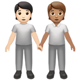 Apple design of the people holding hands: light skin tone medium skin tone emoji verson:ios 16.4
