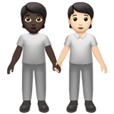 Apple design of the people holding hands: dark skin tone light skin tone emoji verson:ios 16.4
