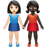 Apple design of the women holding hands: light skin tone dark skin tone emoji verson:ios 16.4