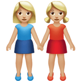 Apple design of the women holding hands: medium-light skin tone emoji verson:ios 16.4