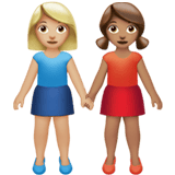 Apple design of the women holding hands: medium-light skin tone medium skin tone emoji verson:ios 16.4