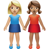 Apple design of the women holding hands: medium-light skin tone medium skin tone emoji verson:ios 16.4