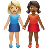 Apple design of the women holding hands: medium-light skin tone medium-dark skin tone emoji verson:ios 16.4