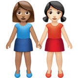 Apple design of the women holding hands: medium skin tone light skin tone emoji verson:ios 16.4