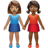 Apple design of the women holding hands: medium skin tone medium-dark skin tone emoji verson:ios 16.4