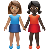 Apple design of the women holding hands: medium skin tone dark skin tone emoji verson:ios 16.4