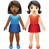 Apple design of the women holding hands: medium-dark skin tone light skin tone emoji verson:ios 16.4