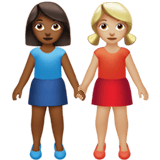 Apple design of the women holding hands: medium-dark skin tone medium-light skin tone emoji verson:ios 16.4