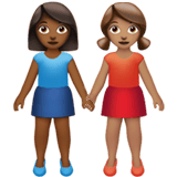 Apple design of the women holding hands: medium-dark skin tone medium skin tone emoji verson:ios 16.4