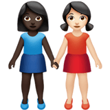 Apple design of the women holding hands: dark skin tone light skin tone emoji verson:ios 16.4