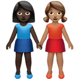 Apple design of the women holding hands: dark skin tone medium skin tone emoji verson:ios 16.4