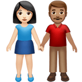 Apple design of the woman and man holding hands: light skin tone medium skin tone emoji verson:ios 16.4