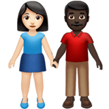 Apple design of the woman and man holding hands: light skin tone dark skin tone emoji verson:ios 16.4