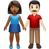 Apple design of the woman and man holding hands: medium-dark skin tone light skin tone emoji verson:ios 16.4