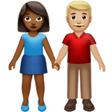 Apple design of the woman and man holding hands: medium-dark skin tone medium-light skin tone emoji verson:ios 16.4