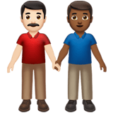 Apple design of the men holding hands: light skin tone medium-dark skin tone emoji verson:ios 16.4
