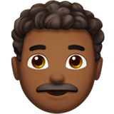 Apple design of the man: medium-dark skin tone curly hair emoji verson:ios 16.4