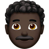 Apple design of the man: dark skin tone curly hair emoji verson:ios 16.4