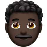 Apple design of the man: dark skin tone curly hair emoji verson:ios 16.4
