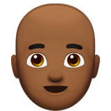 Apple design of the man: medium-dark skin tone bald emoji verson:ios 16.4