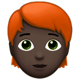 Apple design of the person: dark skin tone red hair emoji verson:ios 16.4