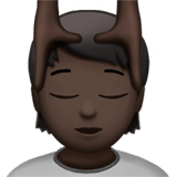 Apple design of the person getting massage: dark skin tone emoji verson:ios 16.4