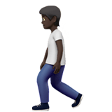 Apple design of the person walking: dark skin tone emoji verson:ios 16.4