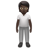 Apple design of the person standing: dark skin tone emoji verson:ios 16.4