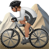 Apple design of the person mountain biking: medium skin tone emoji verson:ios 16.4