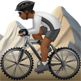 Apple design of the person mountain biking: medium-dark skin tone emoji verson:ios 16.4