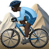 Apple design of the man mountain biking: dark skin tone emoji verson:ios 16.4