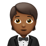 Apple design of the person in tuxedo: medium-dark skin tone emoji verson:ios 16.4