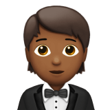 Apple design of the person in tuxedo: medium-dark skin tone emoji verson:ios 16.4