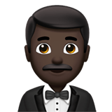Apple design of the man in tuxedo: dark skin tone emoji verson:ios 16.4