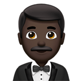 Apple design of the man in tuxedo: dark skin tone emoji verson:ios 16.4