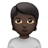 Apple design of the person pouting: dark skin tone emoji verson:ios 16.4