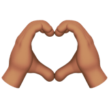 Apple design of the heart hands: medium skin tone emoji verson:ios 16.4