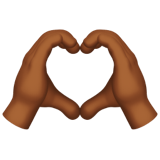 Apple design of the heart hands: medium-dark skin tone emoji verson:ios 16.4