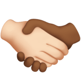 Apple design of the handshake: light skin tone medium-dark skin tone emoji verson:ios 16.4